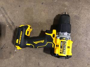 lot 25 image: DEWALT 20V Compact Cordless 12 in. Hammer Drill (Tool Only)   Customer Returns See Pictures