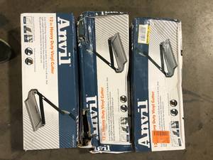 lot 37 image: Lot of 12 in. Luxury Vinyl Tile (LVT) Cutter   Customer Returns See Pictures
