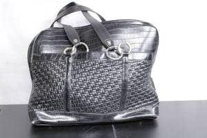 Stylish Black Leather Woven Handbag with Rings and Multiple Compartments