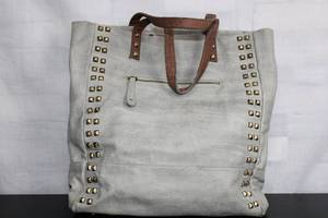 Stylish Gray Leather Tote Bag with Studded Accents and Pouch