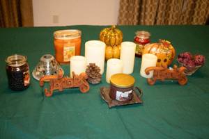 lot 7 image: Assorted Home Dcor Candles and Decorative Pinecones Collection