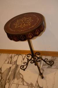 lot 14 image: Elegant Round Accent Table with Intricate Design