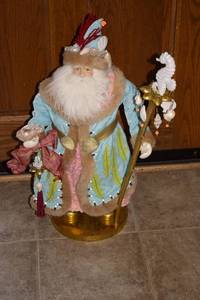 lot 24 image: Vintage Decorative Santa Claus Figure with Sea-Themed Staff