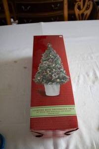 lot 98 image: 24 Lighted Mini Decorated Christmas Tree with Holly and Berries - Indoor Use Only