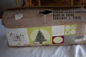 lot 103 image: Martha Stewart 4.5 ft Pre-Lit Artificial Christmas Tree with 300 Clear Lights