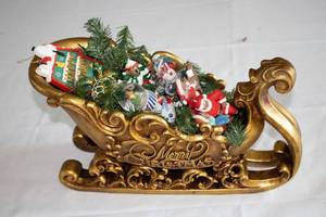 lot 106 image: Vintage Decorated Christmas Sleigh with Ornaments and Greenery