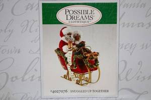 lot 152 image: Possible Dreams Santa Figurine - Snuggled Up Together AA with Lighted Wreath