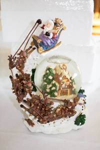 lot 155 image: Lenox Christmas Eve Surprise Snow Globe with Santa and Reindeer