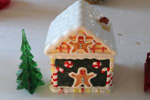 lot 52 image: Gingerbread House Cookie Jar with Decorative Christmas Tree and Snowman on Sled