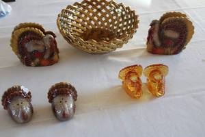 lot 54 image: Collection of 7 Thanksgiving Decor Items - Turkey Salt and Pepper Shakers, Napkin Holders, and Bowl