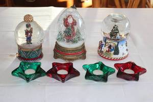 lot 65 image: Set of 2 Christmas Snow Globes and 4 Star-Shaped Candle Holders