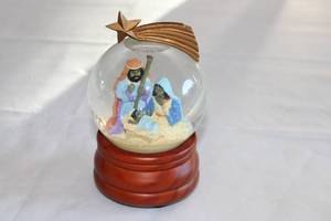 lot 71 image: Nativity Scene Snow Globe with Star Decor