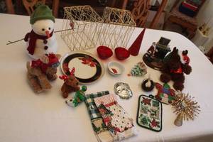 lot 85 image: Holiday Decor Collection including Snowman, Plush Reindeer, Plates, and More
