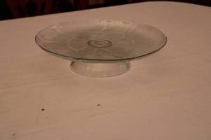 lot 91 image: Vintage Clear Glass Cake Stand with Floral Design