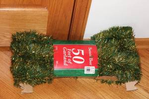 lot 153 image: 50 Feet of Santas Best Garlands with Gold Accents