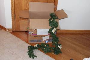 lot 164 image: Holiday Decorative Pine Garland with Gold Accents and Pine Cones