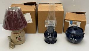 lot 74 image: Misc. Jim Beam (RED WING) Collectors Pieces Including 1 Of 45 Bean Pot, 1 Of 60 Candle Lamp & 1 Of 30 Lamp