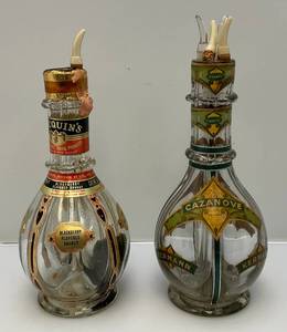 lot 85 image: 1940s Four Chamber Booze Bottles