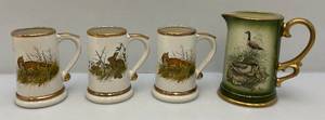 lot 100 image: Misc. 1970s Jim Beam (Lockhardt) Wildlife Pitcher & Steins