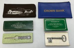 lot 174 image: Vintage Franklin Mint Members Special Gifts And Bank Bags
