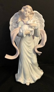 lot 85 image: Porcelain Guardian Angel Figurine