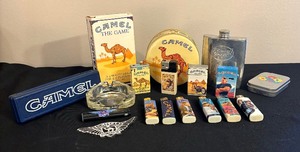 lot 42 image: Vintage Camel Ashtray, Dart Set, Lighters, Patch, Flask and More