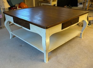 lot 29 image: Elegant Cream and Cherry Finish Coffee Table