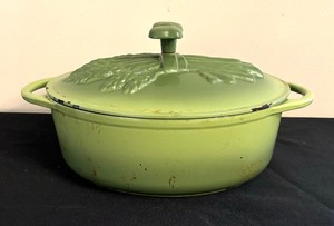 lot 154 image: TECHNIQUE Large Enameled Cast Iron Oval Dutch Oven Green with Asparagus Design
