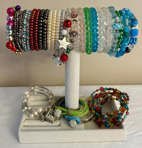lot 202 image: Beautiful Beaded Bracelets and Jewelry Display Stand