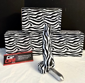 lot 215 image: Three Boxed Set Car Cane Deluxe by Bell Howell