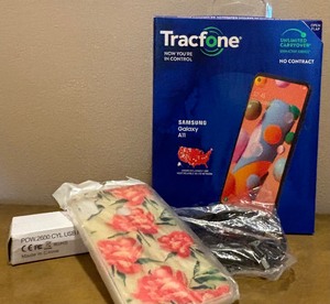lot 33 image: New Tracfone Samsung Galaxy A11,  Phone Cover, Car Charger and Charger