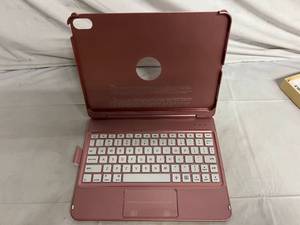 lot 60 image: Rose Gold iPad Case and Keyboard