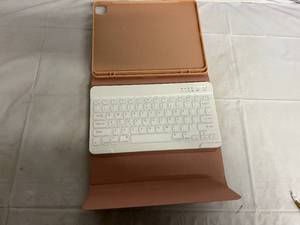 lot 63 image: Pink iPad Case with Removeable Keyboard