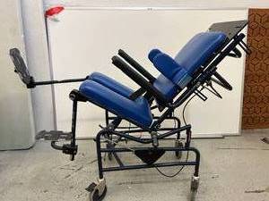 lot 33 image: MSRP $3500 ActiveAid Tilt In Space Commode Shower Chair With Adjusting Footrests - Good Working Condition