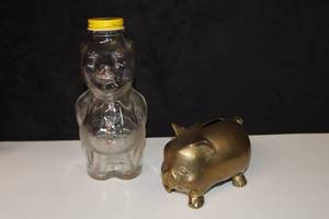 lot 425 image: Collectible Cast Metal Heavy Brass Bank Pig, Clear Glass Piggy Bank 5 wHand Painted Features Metal Cap Pig Piggy Banks