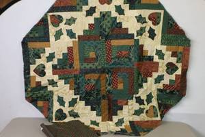 lot 378A image: Vintage Quilt Christmas Tree Skirt Handmade Project Near Complete wBacking Fabric Included Snow Country By for R.J.R. Fashion FabricsThimbleberries.  Current Octagon Size 43-Inch.