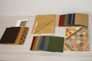 lot 422 image: (2) Quilt Project Kits Complete wCoordinating FabricPatternBookPatch ReUnion Chexx Mixx By Atkinson Designs and Wall Quilt