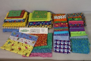 lot 436 image: Bulk Quality Quilting Fabrics Fat Squares BackingHappy Cats by Michelle Miller, R.E.D. International, Quilting Treasures, Marcus Brothers and More