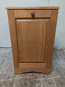 lot 29 image: Tilt out Oak Trash Can Cabinet