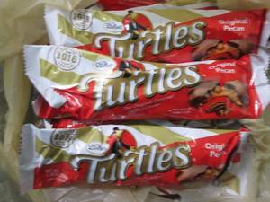 12- 1.76 oz Turtles Bars...