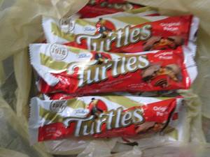 12- 1.76 oz Turtles Bars...