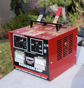 lot 218 image: Century Portable Battery Charger  Engine Starter  Tester