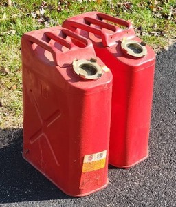 lot 335 image: Classic Red Metal Gas Can Pair
