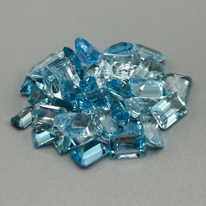 22 Carat Blue Topaz Emerald Cut - Assorted Lot of Loose Stones