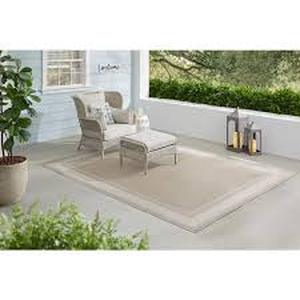 lot 24 image: Hampton Bay Cooper Beige 8 ft. x 10 ft. Border IndoorOutdoor Area Rug     Customer Returns See Pictures