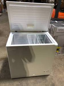 lot 23 image: Vissani 6.9 cu. ft. Manual Defrost Chest Freezer with LED Light Type in White Garage Ready Damaged   Customer Returns See Pictures