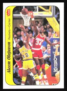 lot 38 image: 1986 Fleer Sticker Akeem Olajuwon Rookie #9