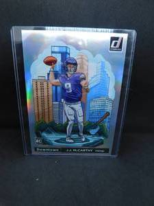 lot 101 image: 2024 Donruss Jumbo Downtown J.J. McCarthy Rookie #11