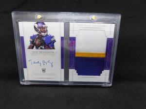 lot 102 image: 2014 National Treasures Booklet Authentic Player Worn Patch Autograph Teddy Bridgewater Rookie Serial #7799
