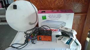 lot 712 image: Scanner, GPS  Battery Charger And More. All In Covered Tote.